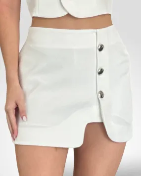 CREPE PUZZLE MINI SKIRT WITH SHINY SILVER BUTTONS
