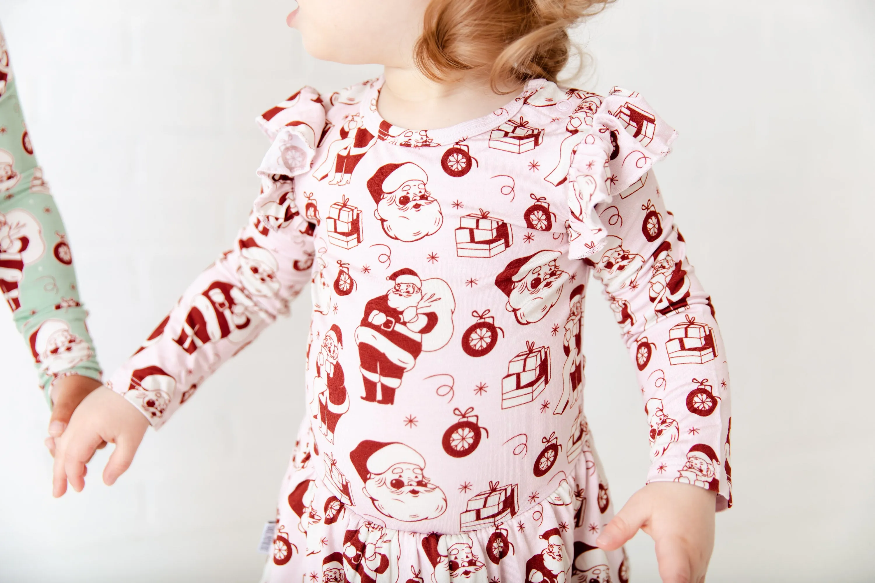 We Believe Long Sleeve Ruffle Romper - Frosty Pink