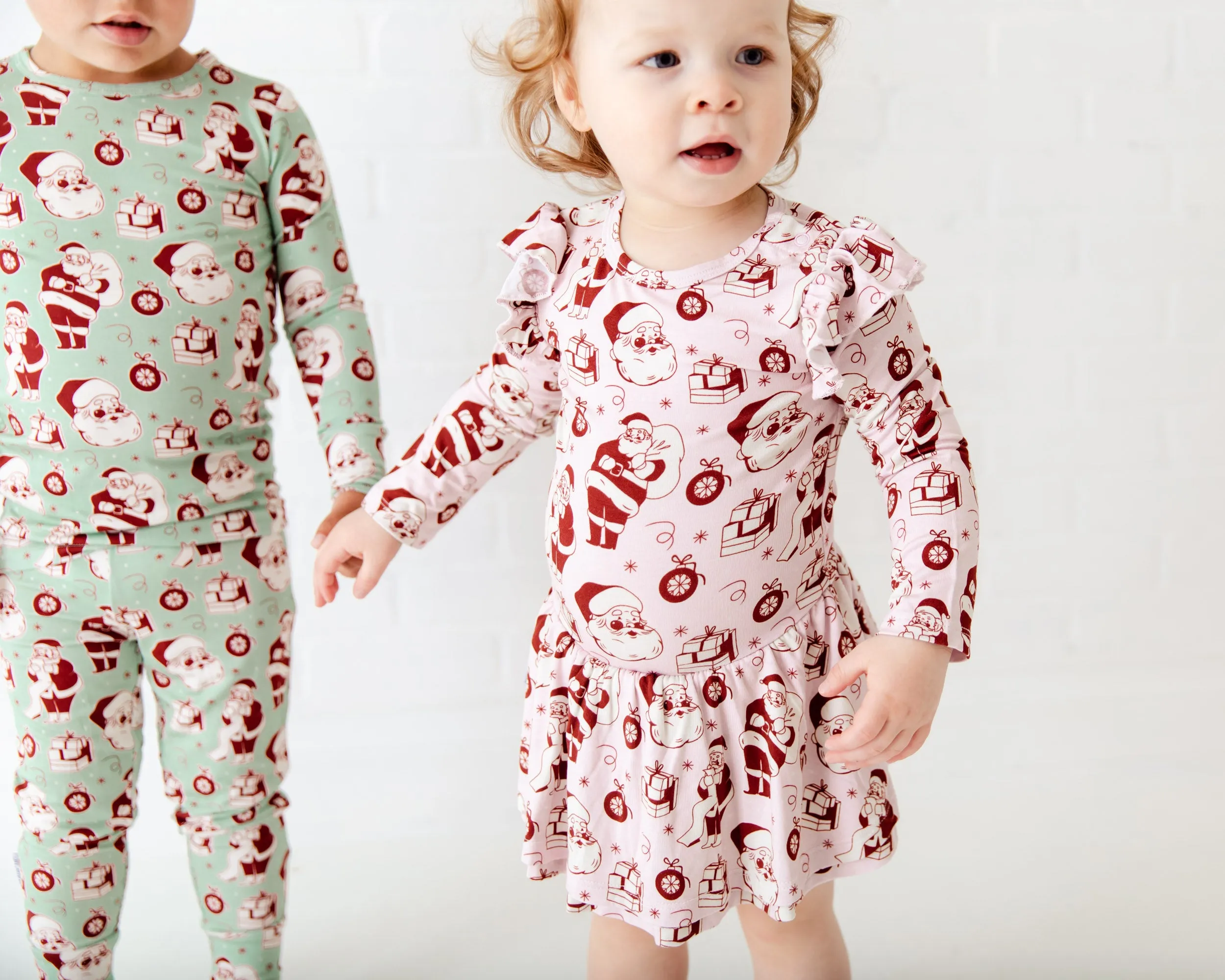 We Believe Long Sleeve Ruffle Romper - Frosty Pink