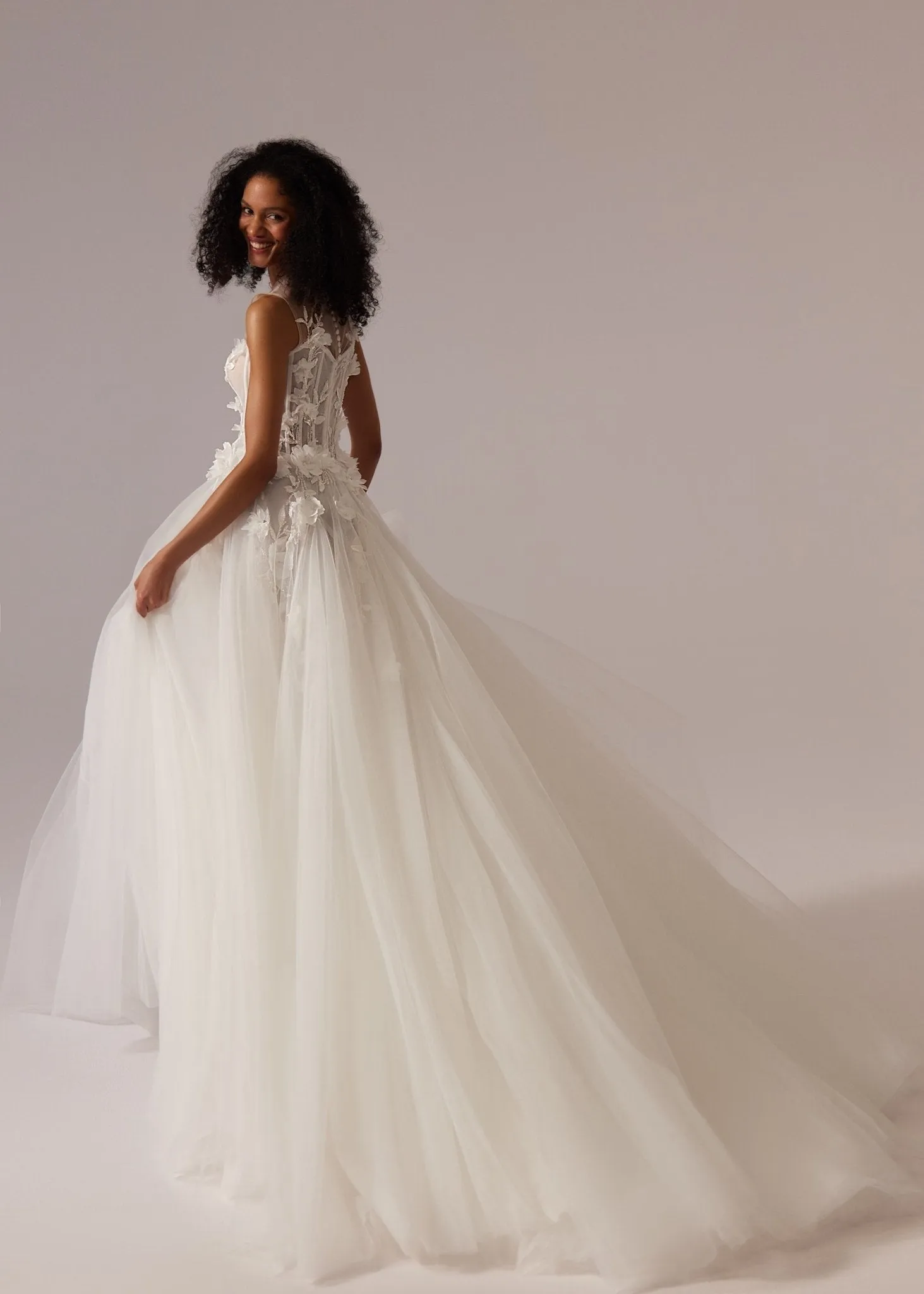 White Floral Appliqué Tulle Wedding Dress with Illusion Bodice, Sheer Sleeveless Design, and Floor-Length Train - Plus Size